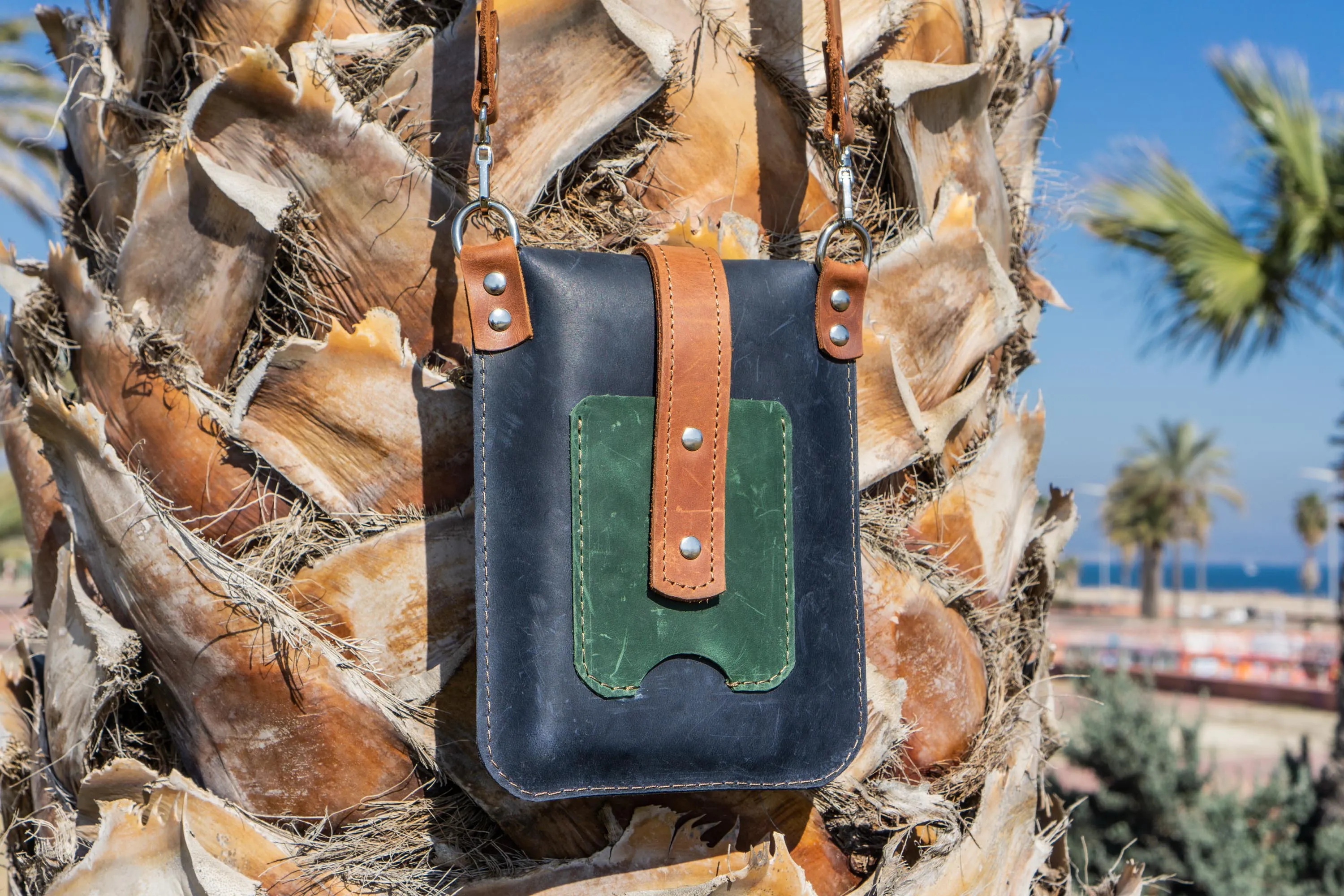 Multi pocket crossbody phone bag. Leather mobile bag.